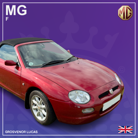 Red MG F sports car with a black soft top, set against a purple background.